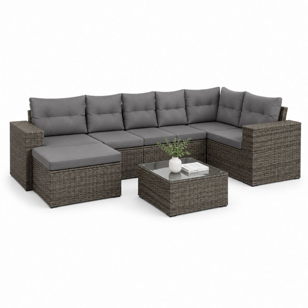 Ensemble de canapé de jardin d'angle modulaire à 7 places en résine tressée PE brun avec coussins gris foncé, table basse et pouf, 265 × 202 × 74 cm