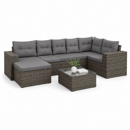 Ensemble de canapé de jardin d'angle modulaire à 7 places en résine tressée PE brun avec coussins gris foncé, table basse et pouf, 265 × 202 × 74 cm